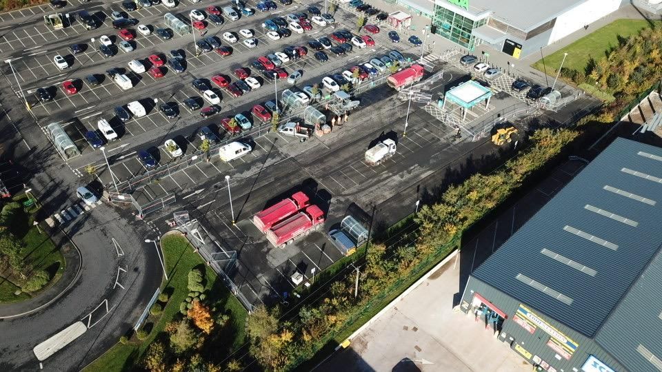 Aerial of the completed car park with the store, service road and bays all marked out.